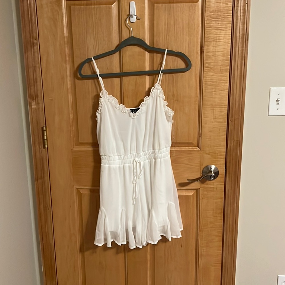 White flowy romper from Francesca’s!